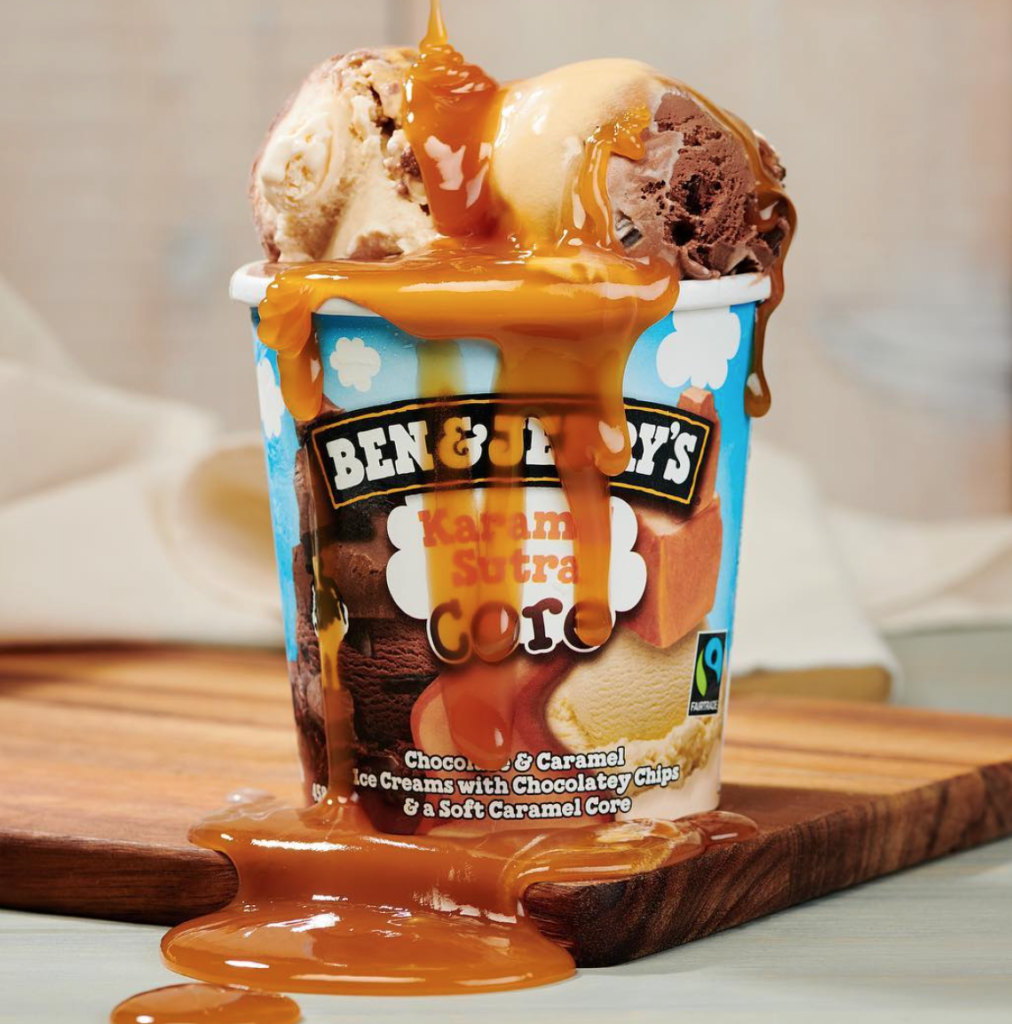 Overflowing pint of ben and jerry's karma sutra ice cream